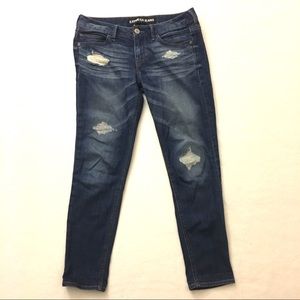 Distressed Express brand jeans